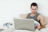Attractive man shopping online