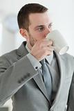 Portrait of a businessman drinking tea