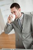 Portrait of a businessman drinking coffee