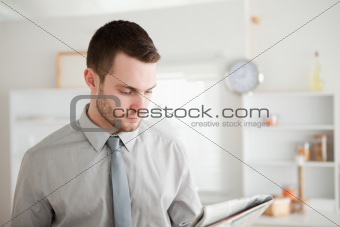 Businessman reading a newspaper