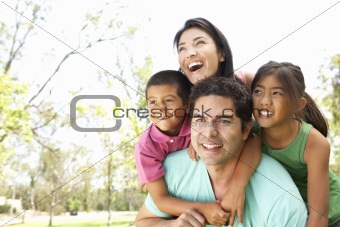 Young Family In Park