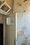 door frame and peeling paint wall