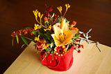 Mixed bouquet of yellow, red and orange flowers