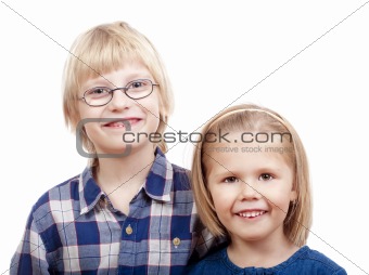 brother and sister looking at the camera, smiling - isolated on white