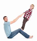 father and son having fun fooling around with each other - isolated on white