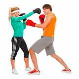 Male and female par in sportswear boxing isolated on white
