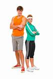 Portrait of slim girl and man in sportswear isolated on white
