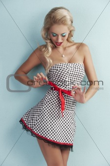 sensual pin girl up playing with ribbon