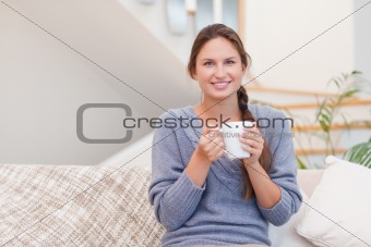 Woman holding a cup of tea