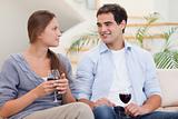 Couple having a glass of red wine