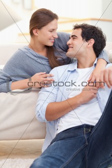 Portrait of a delighted couple hugging