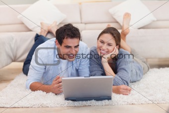 Young couple looking for something on the internet