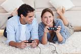 Lovely couple playing video games