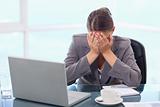 Frustrated businesswoman crying