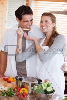 Couple enjoys preparing dinner together