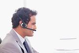 Side view of businessman with headset on