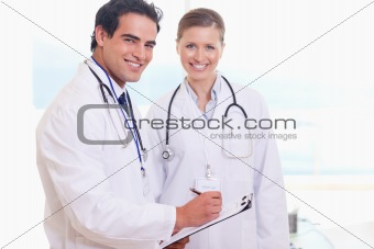 Medical team taking notes