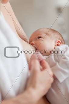Newborn getting lactated
