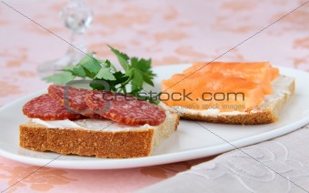 canape sandwiches with salmon  and salami
