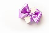 Little gift box with purple bow