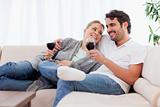 Couple drinking a glass of  red wine