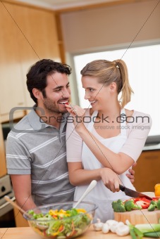 Portrait of a lovely couple cooking
