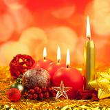 christmas red candles on golden bokeh lights