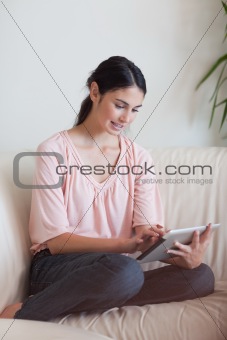 Portrait of a woman using a tablet computer