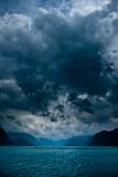 Fjord with dark clouds