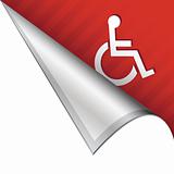 Handicapped icon on peeling corner tab