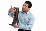 Shoe salesman showing women's boot