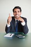 Portrait of an accountant with the thumb up