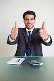 Portrait of an accountant with the thumbs up
