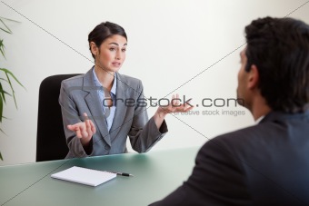 Manager interviewing an employee