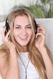 Blond beauty girl wearing headphones