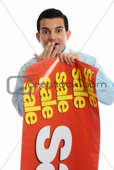 Retail shopkeeper with sale sign, 