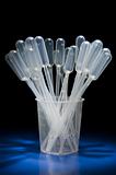 Pack of pipettes standing in measure glass