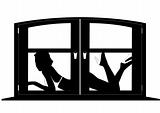 Female silhouette behind a window