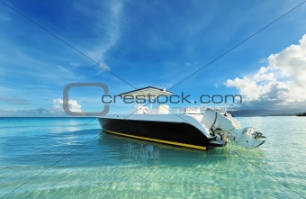 Beautiful beach with motor boat