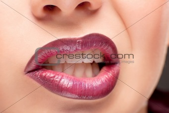 Perfect shiny woman's lips closeup
