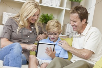 Young Family Parents & Boy Son Using Tablet Computer