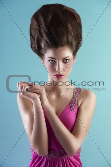 woman in pink with creative hair style