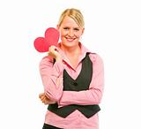 Happy female business clerk holding Valentine paper heart
