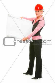 Modern architect woman showing blank flipchart
