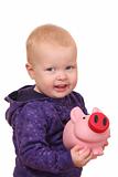 Toddler with piggybank