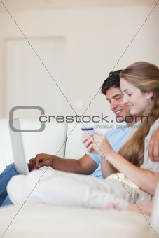 Portrait of a couple shopping online