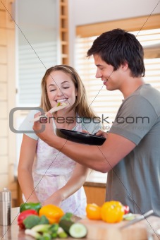 Portrait of a couple preparing dinner