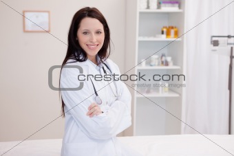 Female doctor with folded arms