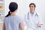 Physician having a conversation with patient