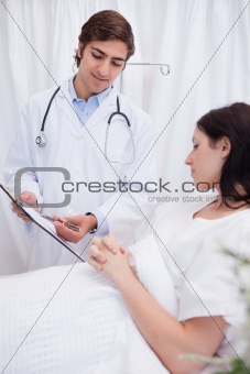 Doctor explaining surgery to his patient
